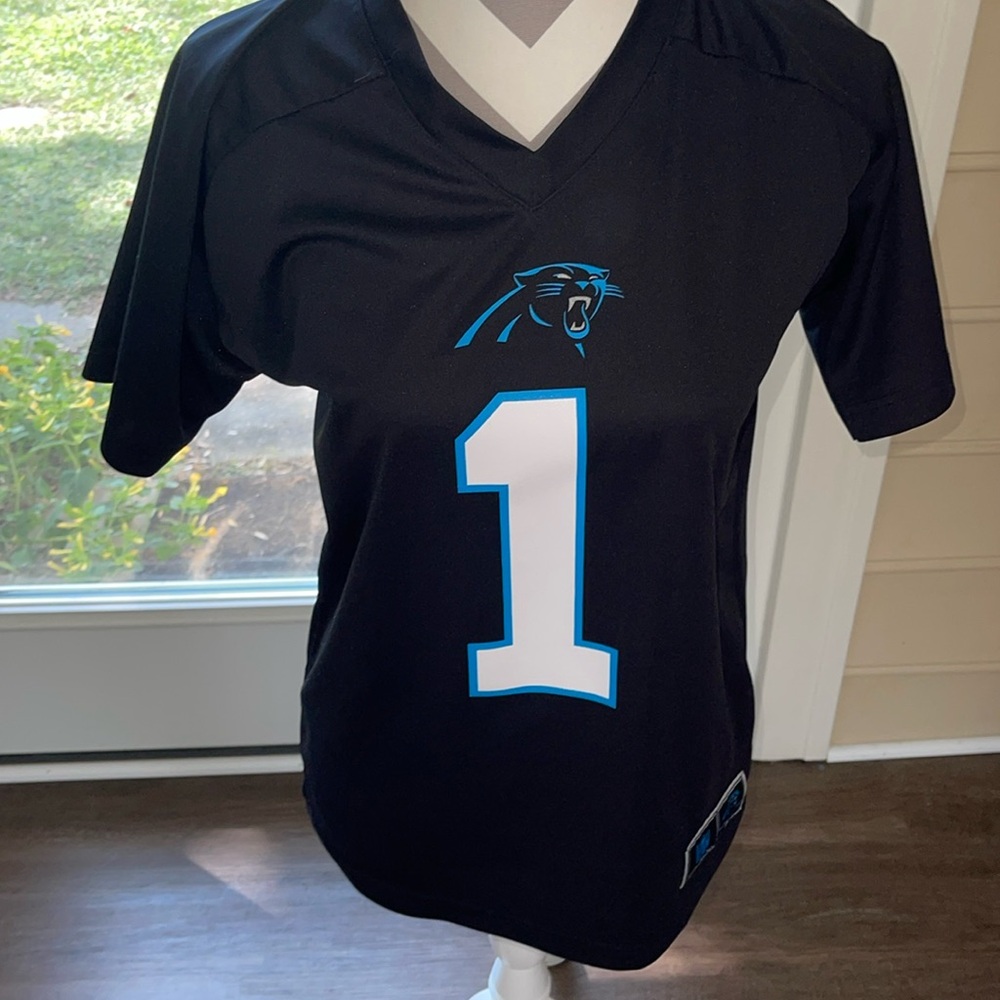 Cam Newton Youth size L jersey.